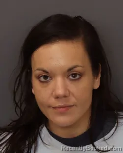 Mugshot of Natalie Rose Woods booked in Dakota County, Minnesota on August 4, 2026