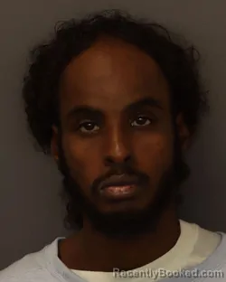 Mugshot of Hussien Saeed Mohamed booked in Dakota County, Minnesota on August 24, 2026