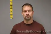 Mugshot of Lee Thomas Huston booked in Freeborn County, Minnesota on August 27, 2026