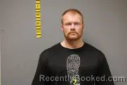 Mugshot of Adam Kyle Thompson booked in Freeborn County, Minnesota on October 8, 2026