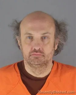 Mugshot of CARL JAMES MANEVAL