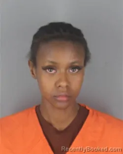 Mugshot of JOAN KEMUNTO OSEBE