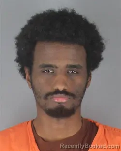 Mugshot of AHMEDDEEQ HAJI HASSAN