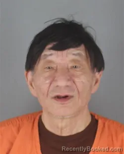 Mugshot of GUOQIANG JIA