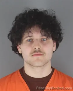 Mugshot of TEO GERALD LEOPOLD LAVERN LECOUSTRE