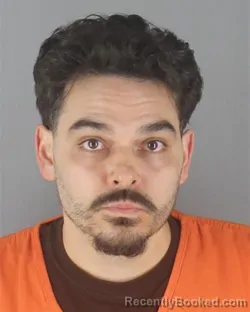 Mugshot of MIGUEL ERNESTO HURTADO