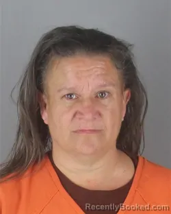 Mugshot of JENNIFER ANNE JORGENSEN booked in Hennepin County, Minnesota on April 16, 2026