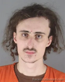 Mugshot of ADAM JOSEPH HANSEN booked in Hennepin County, Minnesota on April 17, 2026