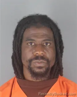 Mugshot of WAYNE DEONTE AKIS booked in Hennepin County, Minnesota on April 17, 2026