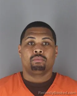 Mugshot of JIMMY MAR CHEA EWING booked in Hennepin County, Minnesota on April 18, 2026