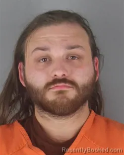 Mugshot of DILLON MYKAL ROGALSKI booked in Hennepin County, Minnesota on April 18, 2026