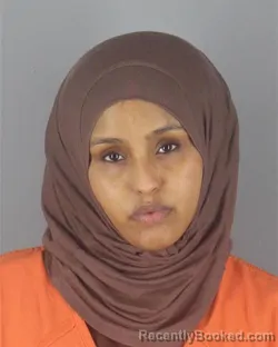 Mugshot of RAIMA MOHAMED MIRE booked in Hennepin County, Minnesota on April 19, 2026