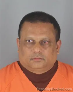 Mugshot of DHARMENDRA SAMKARRAN booked in Hennepin County, Minnesota on April 19, 2026