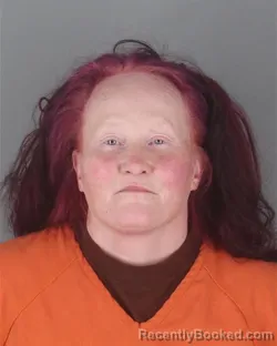 Mugshot of EMILY SUSANNE MARTHA SCHUETT booked in Hennepin County, Minnesota on April 19, 2026