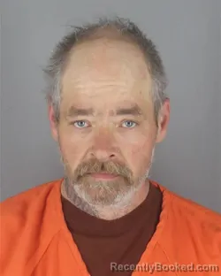 Mugshot of PAUL ELLSWORTH BRILES booked in Hennepin County, Minnesota on April 20, 2026