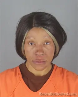 Mugshot of ANGELA MARIE BOOKER booked in Hennepin County, Minnesota on April 20, 2026