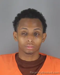 Mugshot of HAMZA HUSSIEN ABDALLA booked in Hennepin County, Minnesota on April 21, 2026