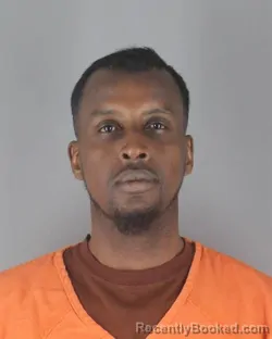 Mugshot of ABDINASIR ABDUL ALI booked in Hennepin County, Minnesota on April 21, 2026
