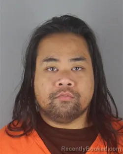Mugshot of KHOMPHET HONG booked in Hennepin County, Minnesota on April 21, 2026