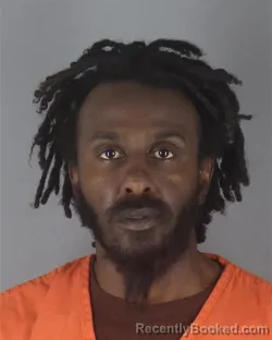 Mugshot of JAMAL MOHAMED GULED booked in Hennepin County, Minnesota on April 21, 2026