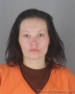 Mugshot of BRIANA BETH MARTINEZ booked in Hennepin County, Minnesota on April 21, 2026