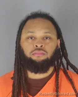 Mugshot of TRAVON JERMAINE MCKEE booked in Hennepin County, Minnesota on April 21, 2026