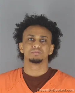 Mugshot of ROBLE MAHAMMED ABADER booked in Hennepin County, Minnesota on April 21, 2026