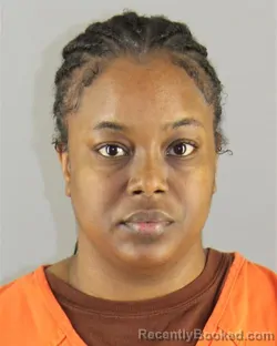 Mugshot of MHSHAILA RAEVON ROWE booked in Hennepin County, Minnesota on April 21, 2026