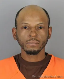 Mugshot of KERRY VONERIC WIGGINS booked in Hennepin County, Minnesota on April 21, 2026