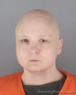 Mugshot of JUNE BEVERLY GEE booked in Hennepin County, Minnesota on April 21, 2026