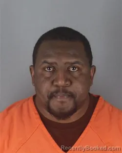 Mugshot of NAHASHON BOSIRE MOBISA booked in Hennepin County, Minnesota on April 21, 2026