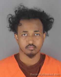 Mugshot of MOHAMED AMIN ABDIRAHMAN ADEN booked in Hennepin County, Minnesota on April 21, 2026