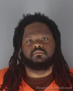 Mugshot of KORTEZ MARVELL JOHNSON booked in Hennepin County, Minnesota on April 22, 2026