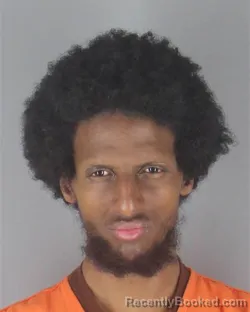 Mugshot of MOHAMED HUSSIEN HULBALE booked in Hennepin County, Minnesota on April 22, 2026