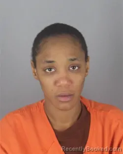 Mugshot of TIAUNNA SHEREE SCOTT booked in Hennepin County, Minnesota on April 22, 2026