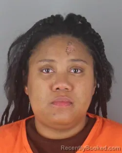 Mugshot of LATISHA RENAE SMITH booked in Hennepin County, Minnesota on April 22, 2026