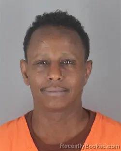 Mugshot of IBRAHIM HAJI AHMED booked in Hennepin County, Minnesota on April 23, 2026