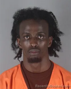 Mugshot of MOHAMED HASSAN ROOBLE booked in Hennepin County, Minnesota on April 23, 2026