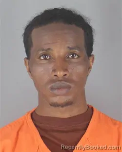 Mugshot of ABDIRISAK MUKTAR OMAR booked in Hennepin County, Minnesota on April 23, 2026