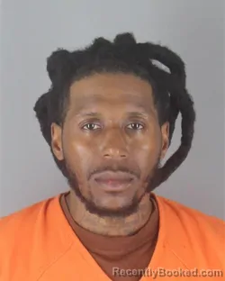 Mugshot of DEVRON JEREL BROWN booked in Hennepin County, Minnesota on April 24, 2026