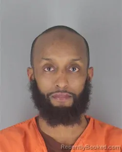 Mugshot of ABDULAHI MOHAMED AHMED booked in Hennepin County, Minnesota on April 24, 2026