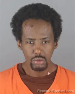Mugshot of MOHAMED SEED YUSSUF booked in Hennepin County, Minnesota on April 24, 2026