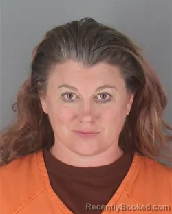 Mugshot of DANIELLE KAY MCFARLAND booked in Hennepin County, Minnesota on April 24, 2026