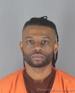 Mugshot of DOMINIQUE DEMETRICE FARRAR booked in Hennepin County, Minnesota on April 24, 2026