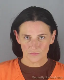 Mugshot of JENNIFER LYNN RAJA booked in Hennepin County, Minnesota on April 24, 2026