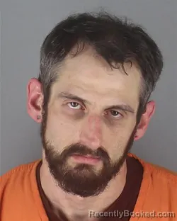 Mugshot of JOSHUA DANIEL LYCZKOWSKI booked in Hennepin County, Minnesota on April 25, 2026
