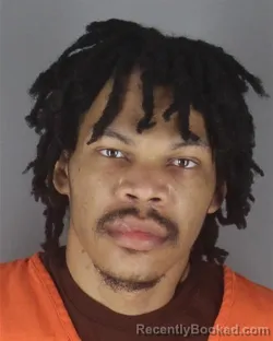 Mugshot of MARTINEZ DEJUAN DESHO THOMPSON booked in Hennepin County, Minnesota on April 25, 2026