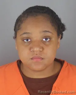 Mugshot of DEANGELA TODDAY WARNER booked in Hennepin County, Minnesota on April 25, 2026