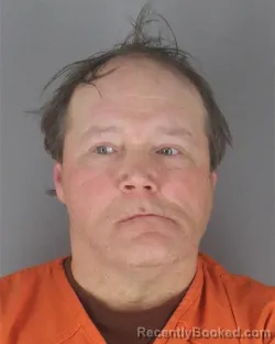 Mugshot of BRECK ROBERT HOUGHTALING booked in Hennepin County, Minnesota on April 25, 2026