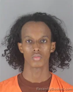 Mugshot of ABBAS SHUGRI ABDI booked in Hennepin County, Minnesota on April 26, 2026